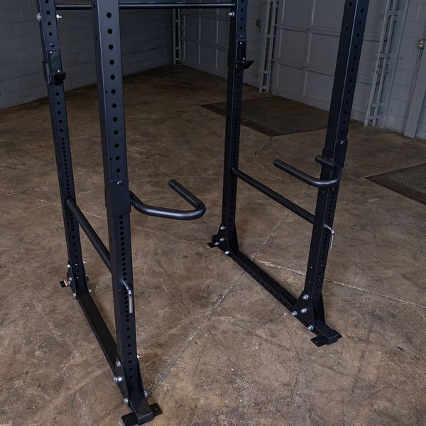 Perform Parallel Bar Dips Using Rack Attachment