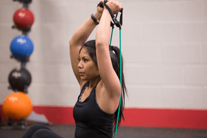 Resistance tube squat press exercise