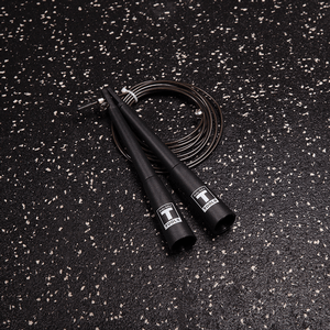 Cable speed rope shown on exercise mat