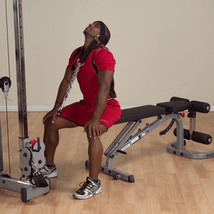Sitting neck exercise using nylon head harness