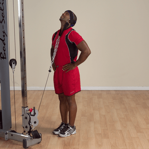 Standing neck exercise using nylon head harness