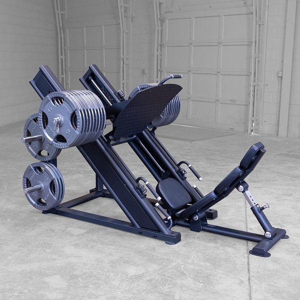 Loaded leg press machine prepared for heavy resistance training