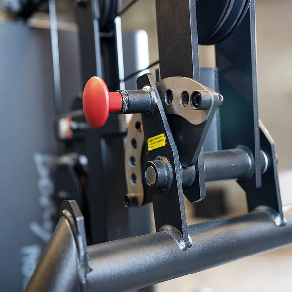 Adjusting weight stacks on a four stack commercial gym for resistance